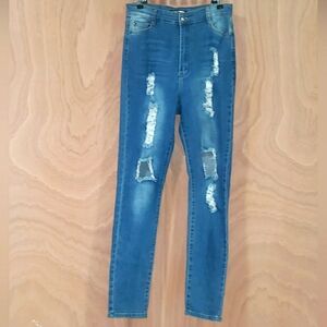 FASHION NOVA DISTRESSED JEANS